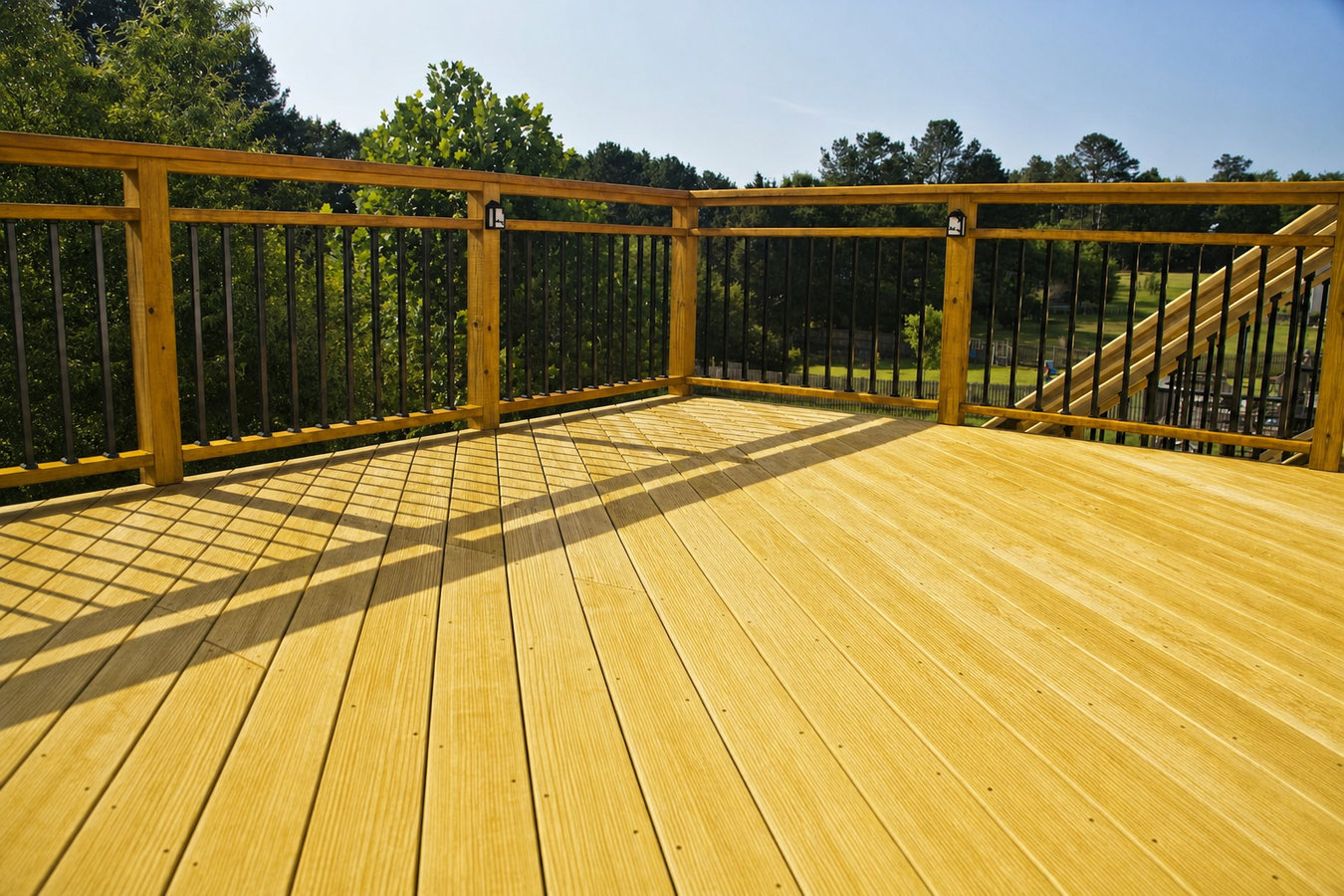 Pressure-treated wood deck construction